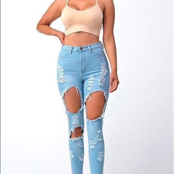Distressed Denim With Ripped Bell Bottoms - Picture 7 of 8